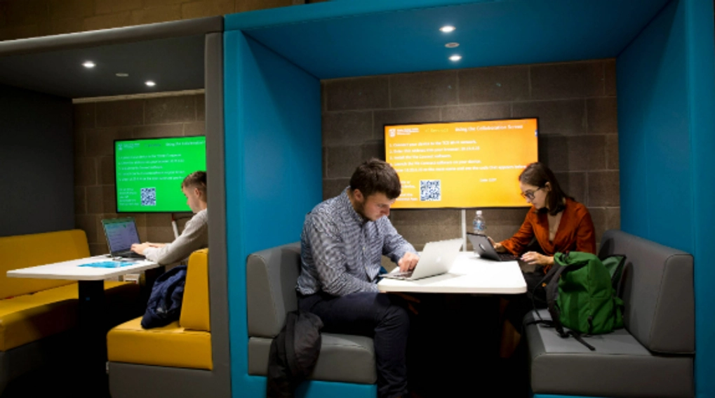 Two people studying in a 'pod' in the Arts Building, Trinity College Dublin
