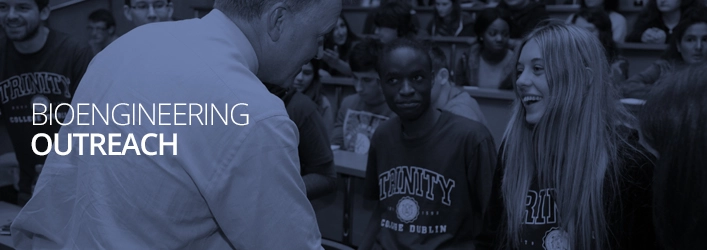 Students in a lecture hall with a blue tent overlay on the image