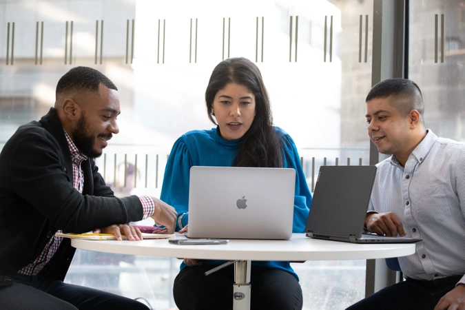 Full-time MBA students working on a group project