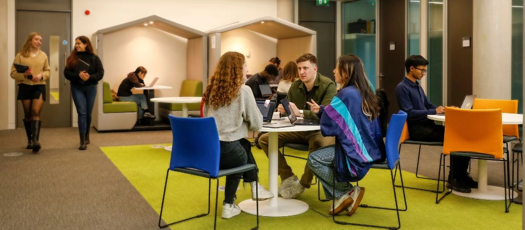 Students sitting at a desk study