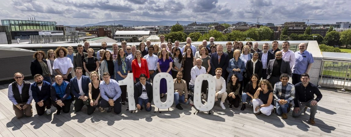 Staff gather on rooftop for photo to mark 100 years