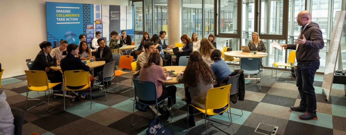 Medical and nursing students working on test patient dummies in a hospital ward