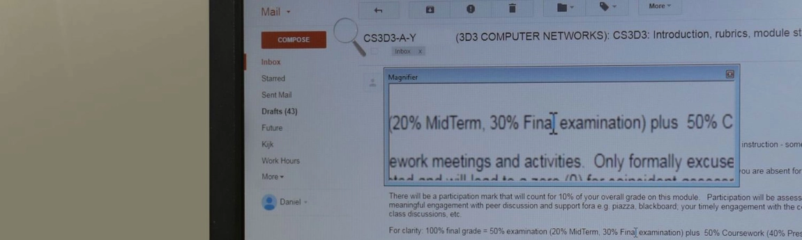 A magnified screen reader displaying email text in large text