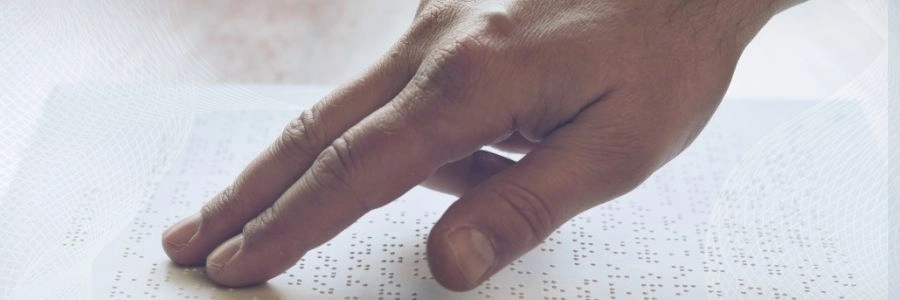 Person reading braille