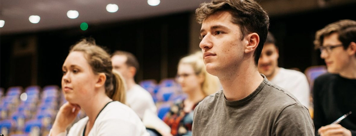 Six students in a lecture theatre