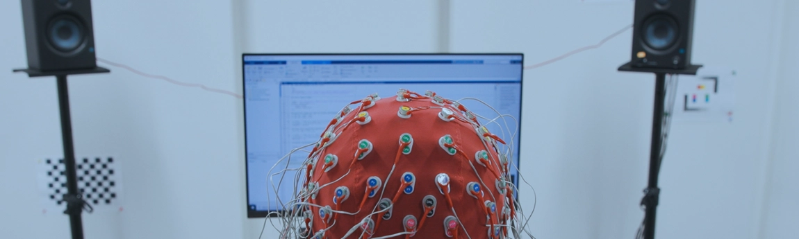 An image of a research subject with EEG cap