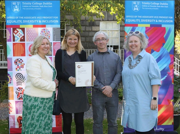 School of English staff receiving the Athena Swan Bronze Award