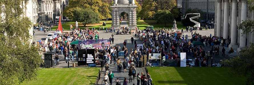 Group of Trinity College students at a School Champions event. TCD Front Square