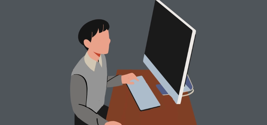 image of student sitting at desk