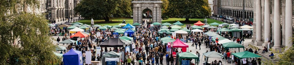 Fresher's Fair stalls and crowds of students in Front Square.