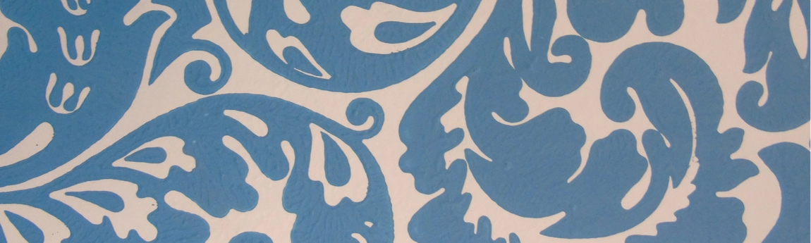 Decorative wallpaper for 36 Fenian Street features a botanical pattern in a shade of blue on cream.