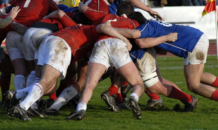 group of rugby players in a scrum