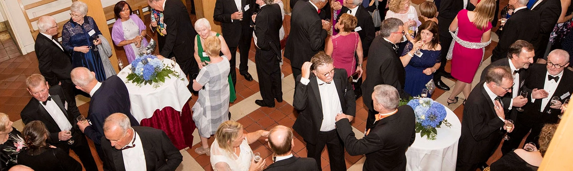 Alumni gathering in the Atrium in Trinity