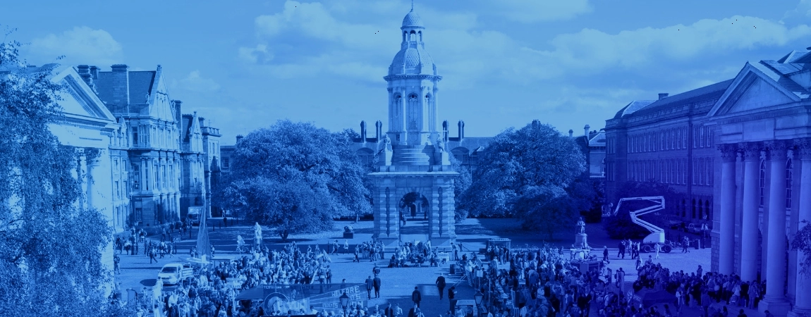 A view of the Campanile at Trinity College Dublin surrounded by open day students