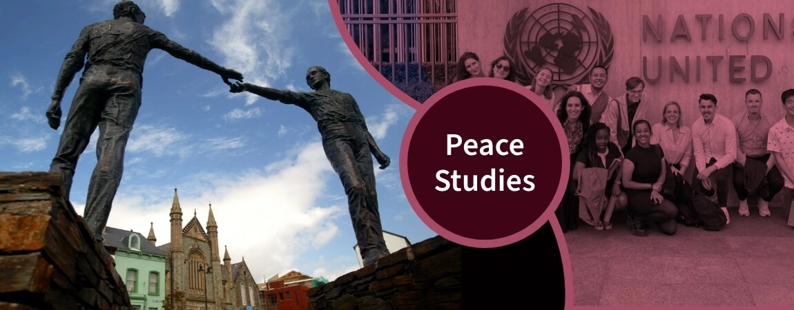 Peace symbol, statue of two people holding hands in the air