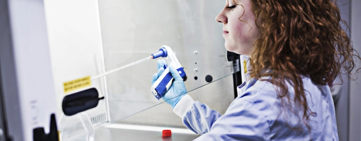 Trinity College, Science Student working in the lab.