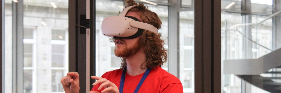 A student using a Virtual Reality headset