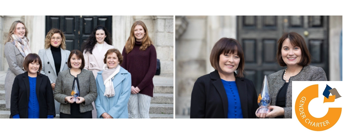 academic staff laughing outside building