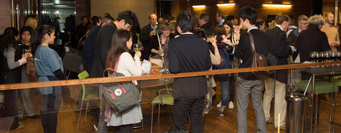 Group of people chatting and laughing