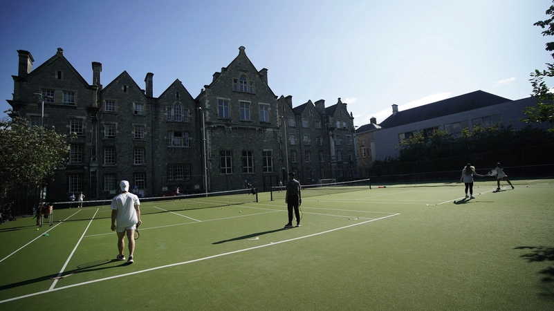 Tennis courses at Botany Bay showing players on the courts in the sunshine