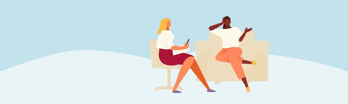 Two people in conversation at a counselling session