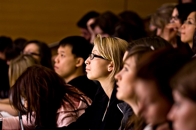 Students in a lecture hall at Trinity College Dublin