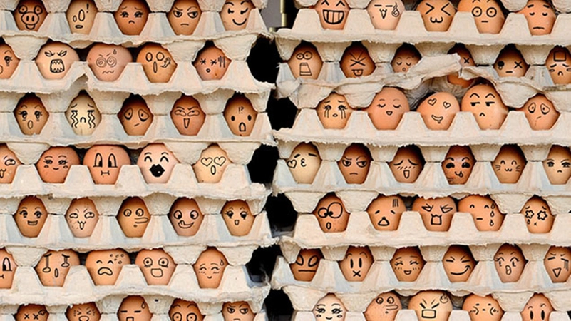Diversity represent through faces drawn on eggs
