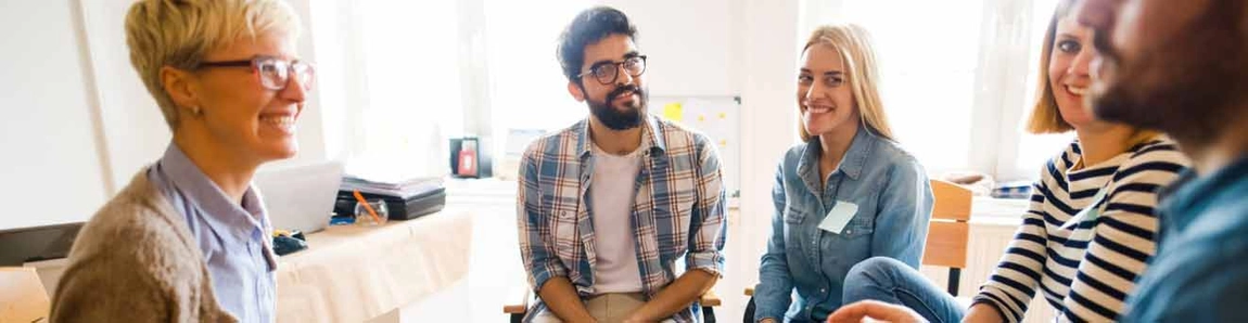 Five people having a meeting