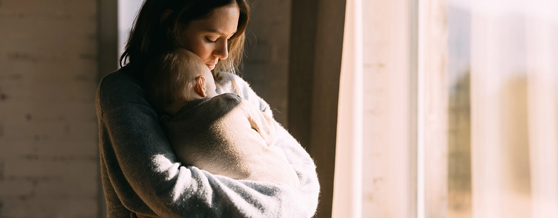 Mother holding baby
