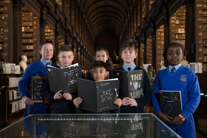 Children holding books