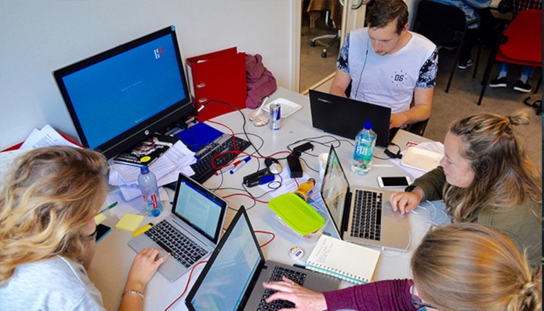 Students working on laptops
