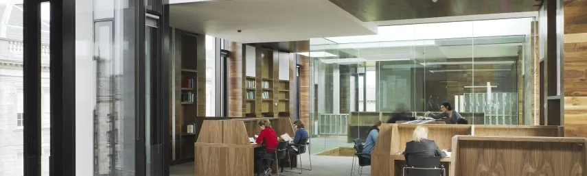 Postgraduate researchers working at desks