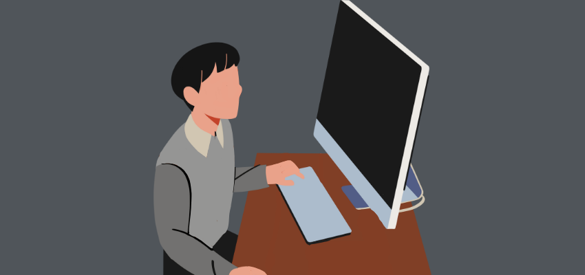 image of student sitting at desk