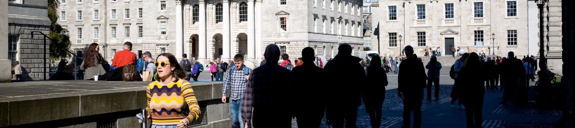 Students walking toward Trinity's Front Square.