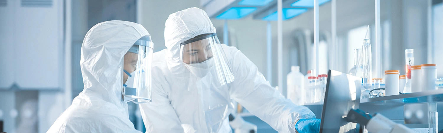 Two lab workers carried out experiments in a lab