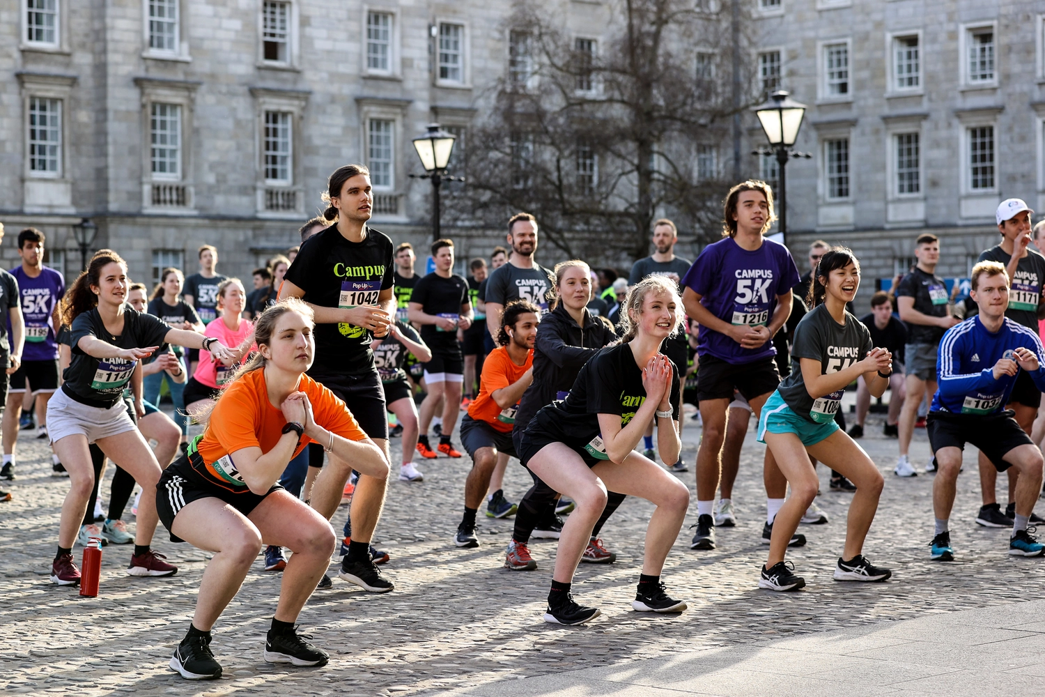 Health and Sport week 2026 banner showing runners warming up for campus run at Front Square