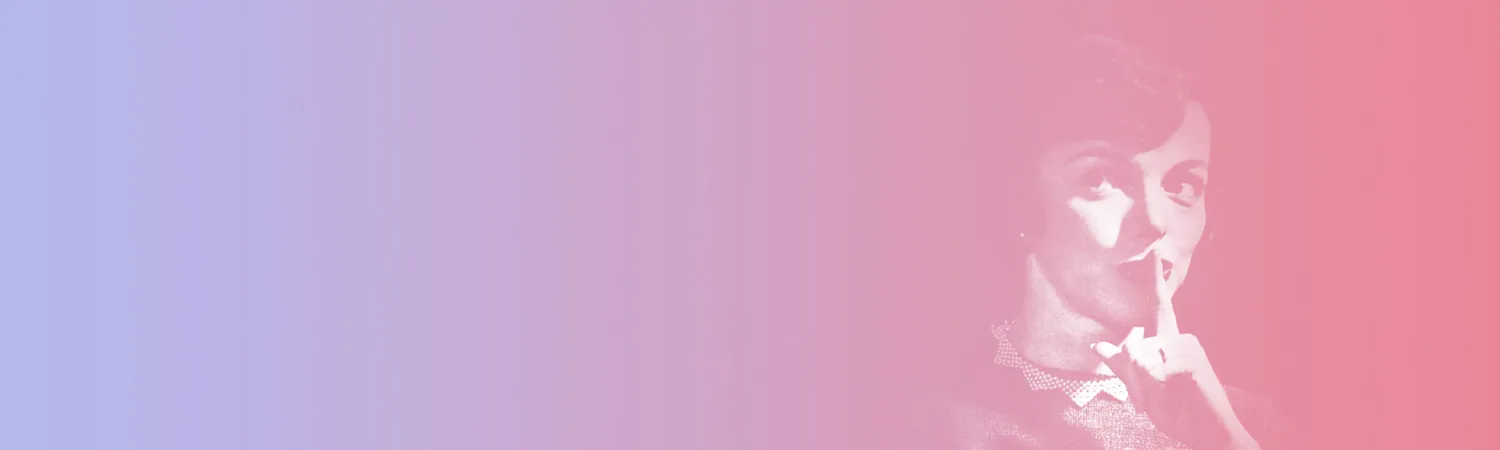 A woman whispering with her finger over her mouth