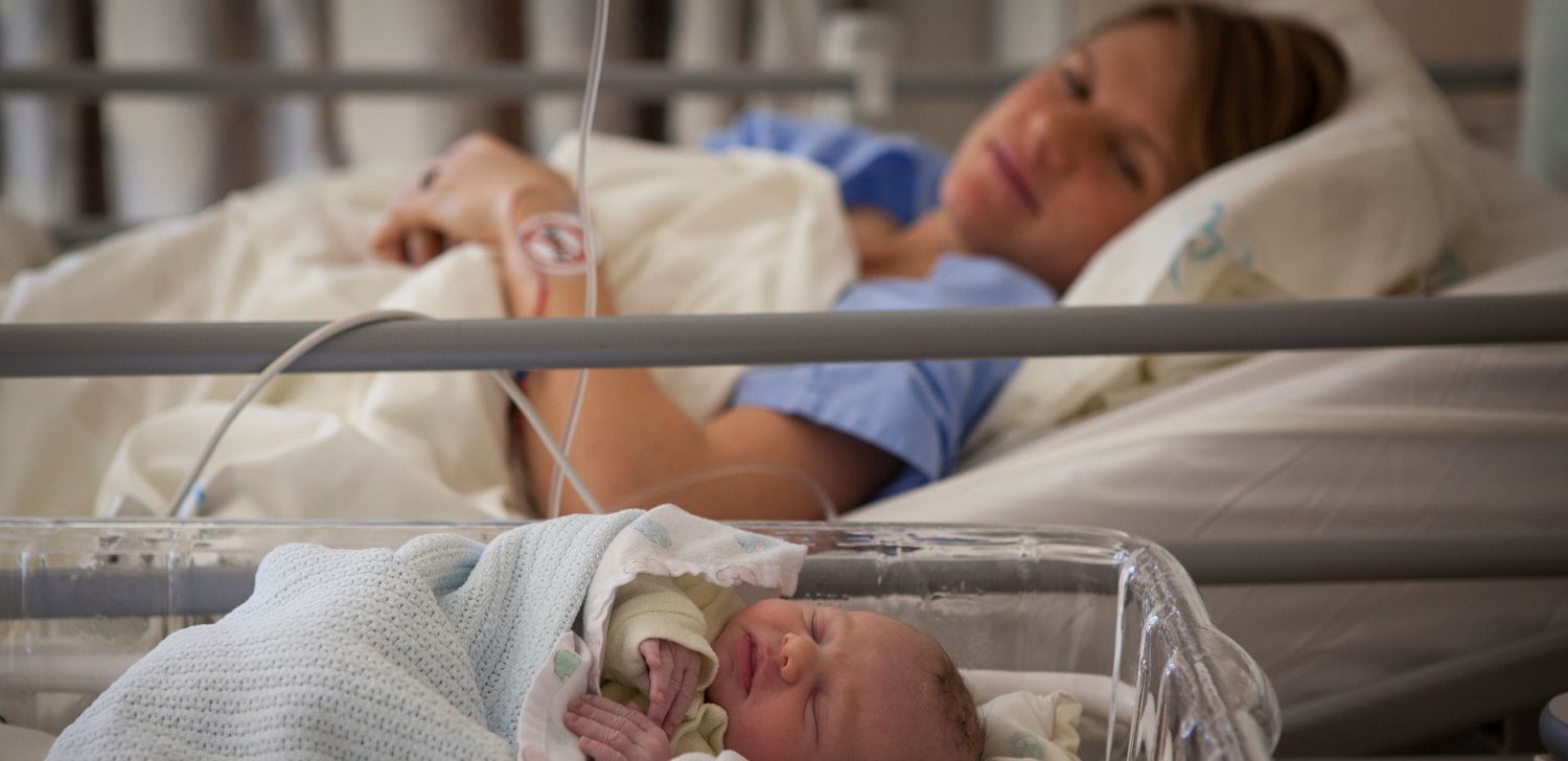 mother and baby in neonatal ward