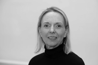 Mrs. Virginie Tracey