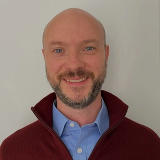 Dr. Colin John Flynn