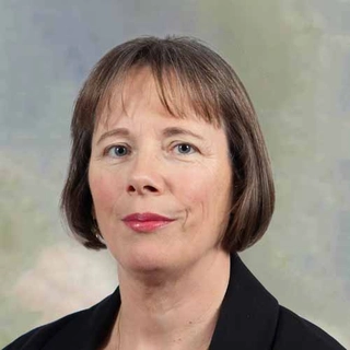 Ms. Anne-Marie Corroon