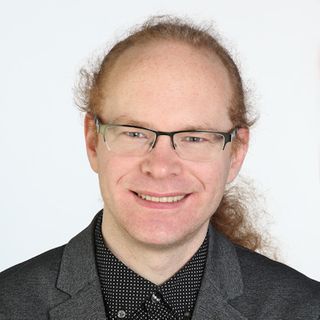 Dr.