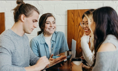 Group of students collaborating in a casual setting