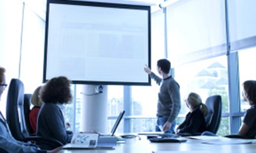 Lecturer using white screen
