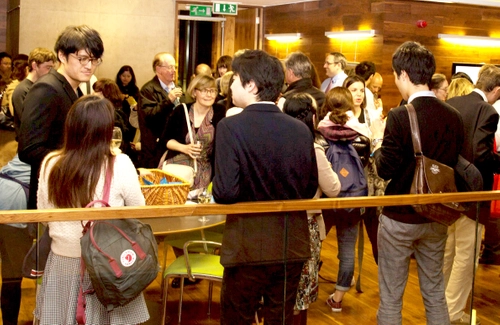Students attending a reception at Trinity Centre for Asian Studies