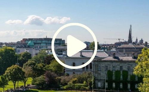 An external shot of the school with the programme name and date overlaid