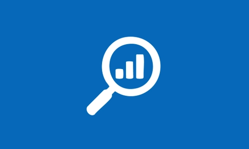 An image of a magnifying glass with a bar chart inside