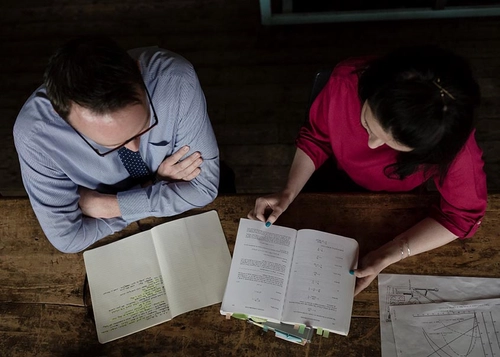 postgraduate students studying