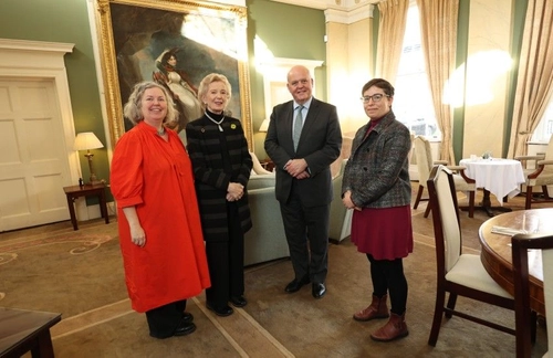 Launch Photo of Hub - 4 figures standing together - key members of the launch including Provost and Hub Director