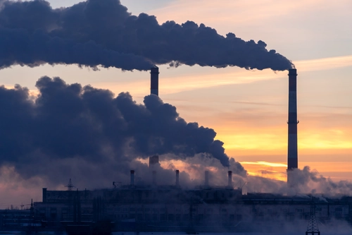 Smoke stacks producing Air Pollution